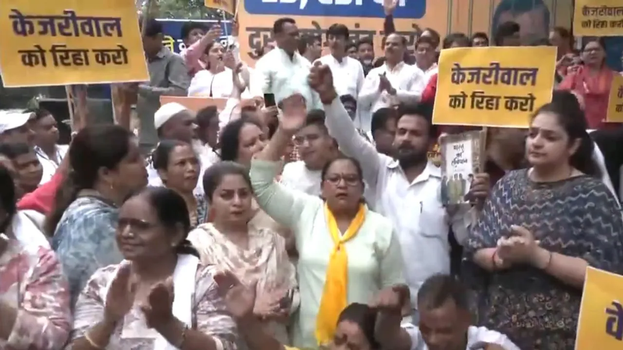 Aam Aadmi Party (AAP) workers protest against the arrest of Delhi CM and AAP National Convenor Arvind Kejriwal by CBI, in Delhi