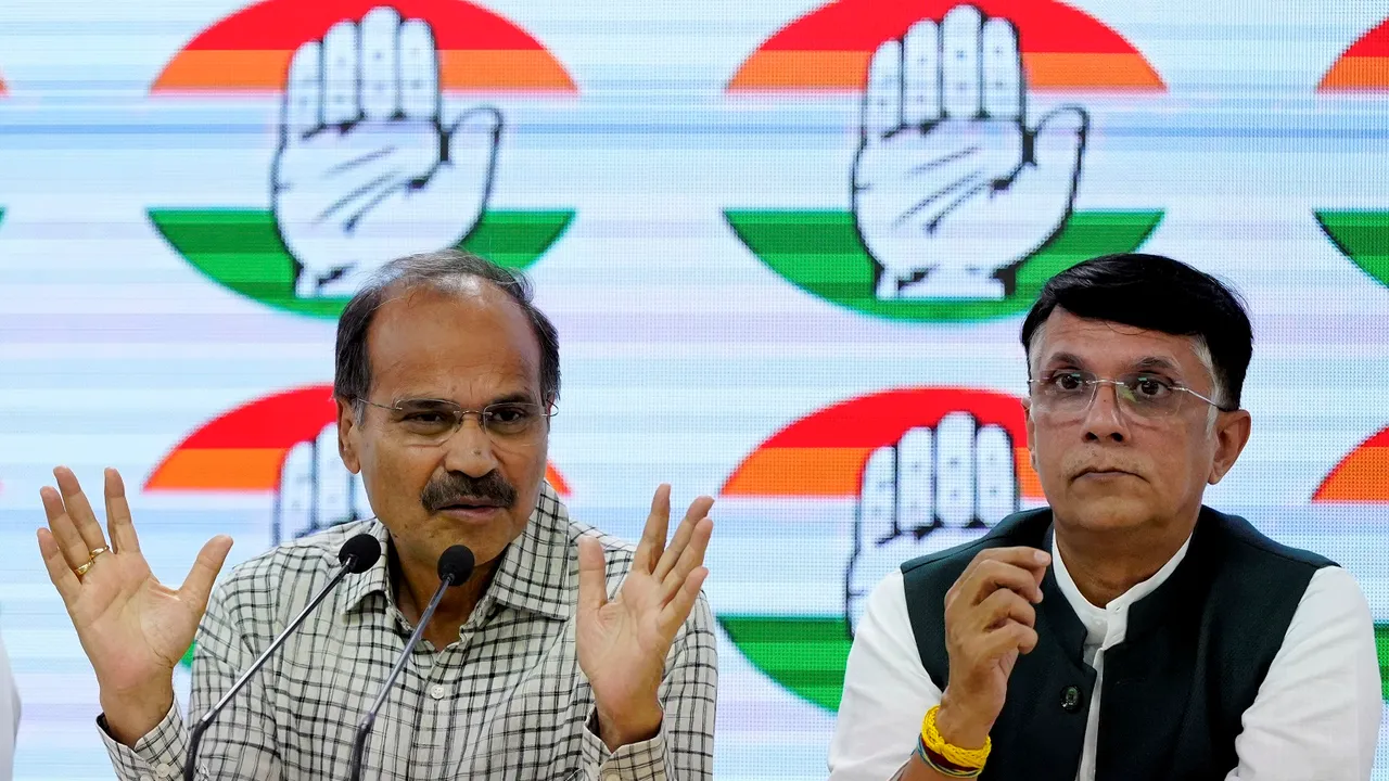 Congress leaders Adhir Ranjan Chowdhury and Pawan Khera at a press conference at AICC HQ in New Delhi