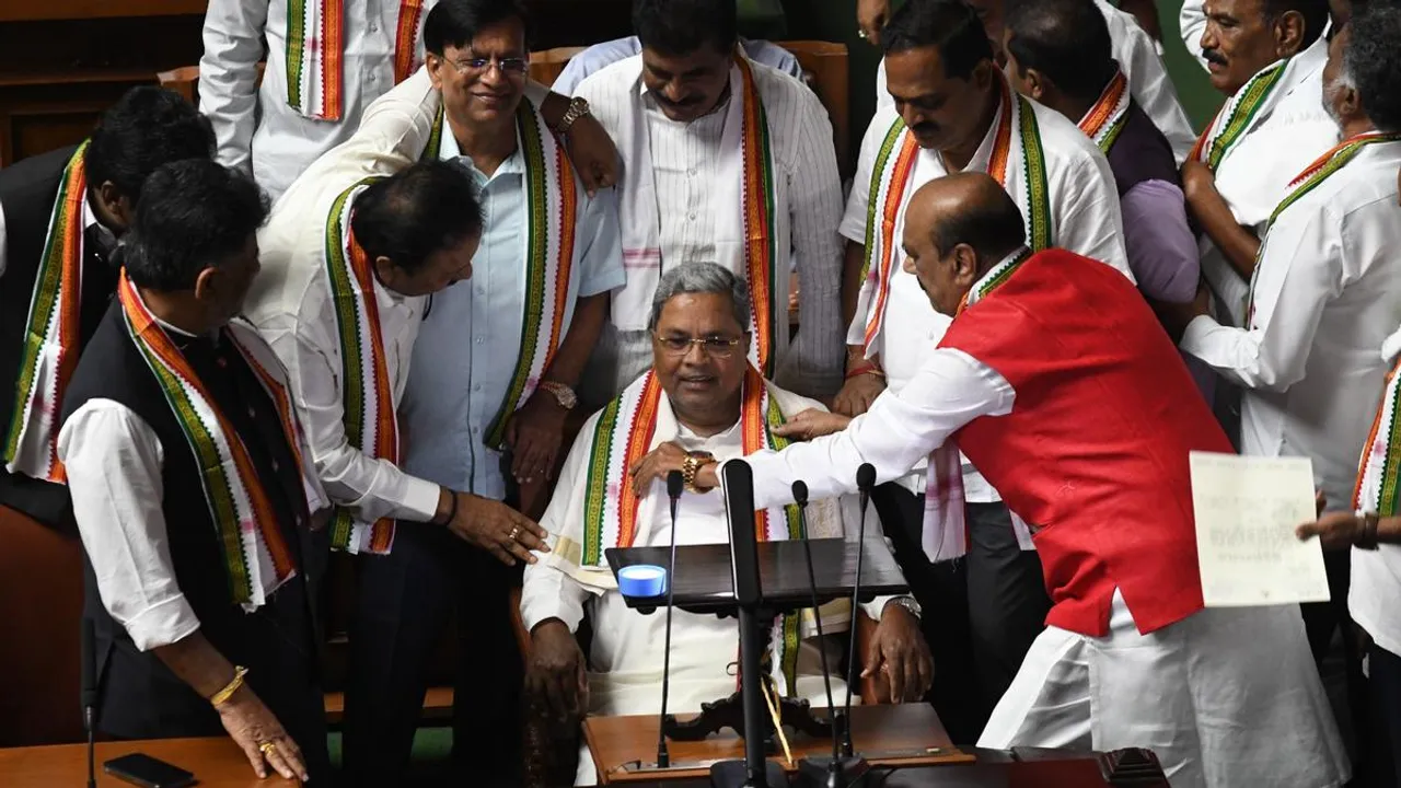 Karnataka Chief Minister Siddaramaiah with Dy CM DK Shivkumar and other ministers and legislators while presenting the State Budget