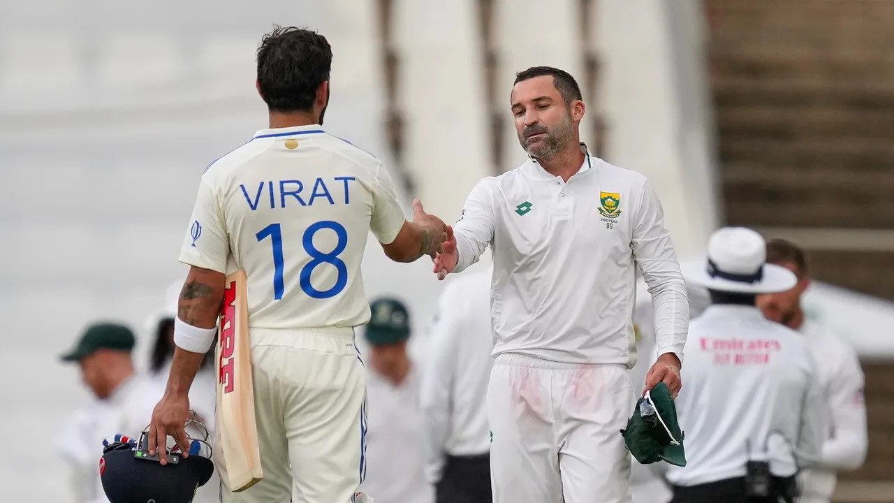 South African and Indian players exchange greetings after the end of the first Test cricket match between India and South Africa