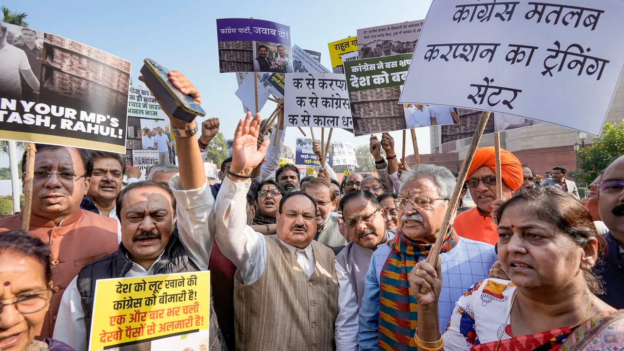 BJP National President and MP J.P. Nadda with party MPs during a protest against Congress during the Winter session of Parliament