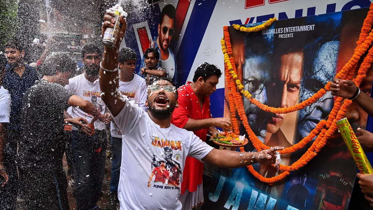 Fans of actor Shah Rukh Khan celebrate the release of his movie ‘Jawan’ at a cinema hall, in Kolkata