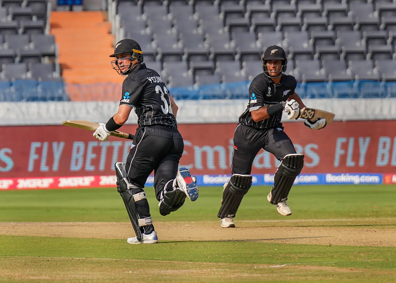 New Zealand's batters Will Young and Rachin Ravindra run between the wickets during the ICC Men's Cricket World Cup 2023 match between New Zealand and Netherlands