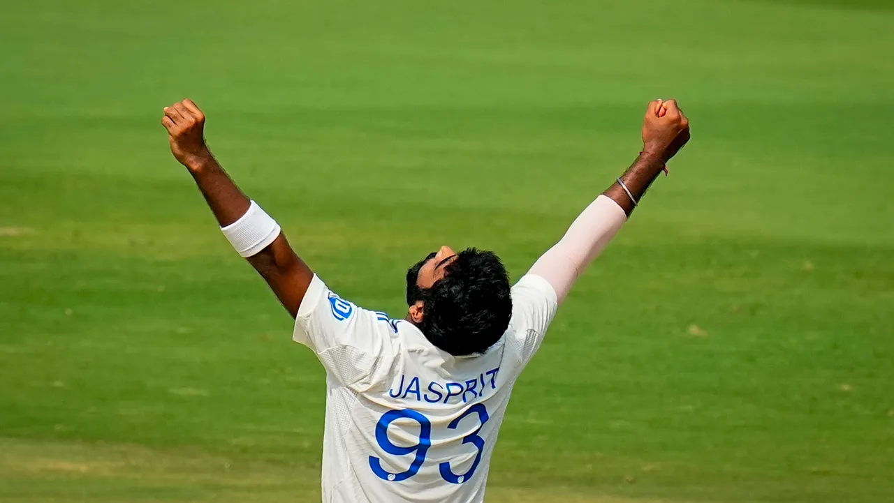 India's Jasprit Bumrah with celebrates the wicket of England's batter Tom Hartley during the fourth day of the second Test match between India and England