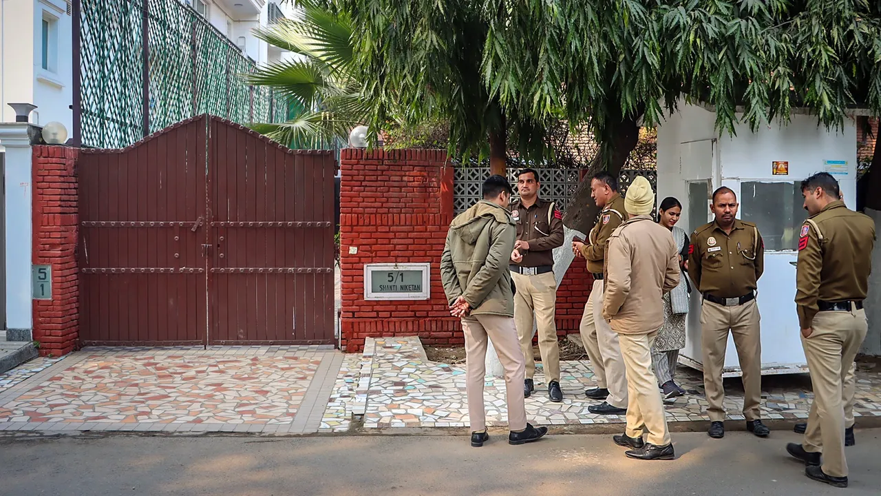 Police personnel stand guard outside Jharkhand Chief Minister Hemant Soren's residence, in New Delhi