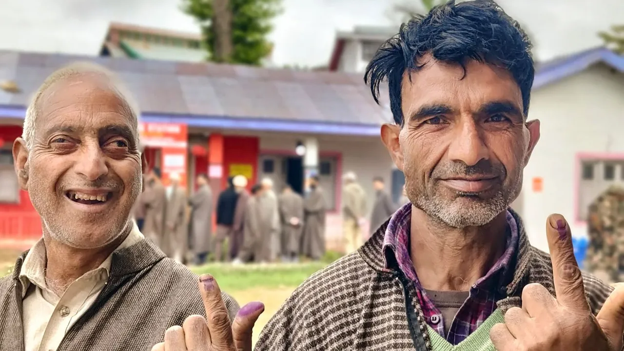 People show their inked fingers after casting their votes at a polling booth during the fourth phase of General Elections-2024 in Srinagar, J & K, Monday, May 13, 2024