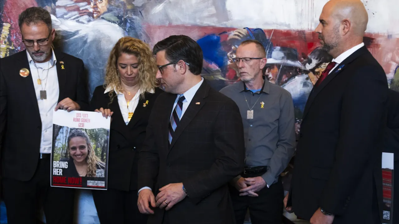 House Speaker Mike Johnson, third from left, and Speaker of the Israeli Knesset Amir Ohana, right, during a meeting with the families of hostages being held in Gaza on Feb. 6, 2024, on Capitol Hill (AP Photo/Manuel Bale Ceneta)