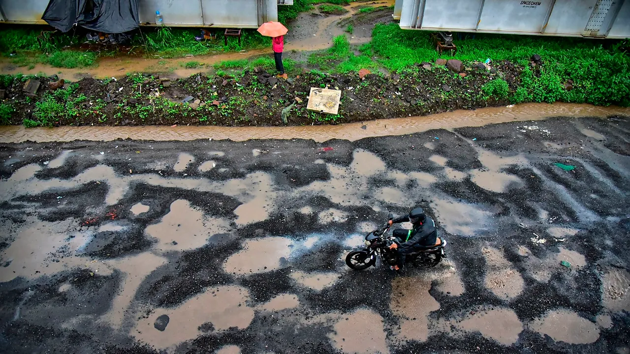 Weather Monsoon rain in Navi Mumbai Rains Potholes