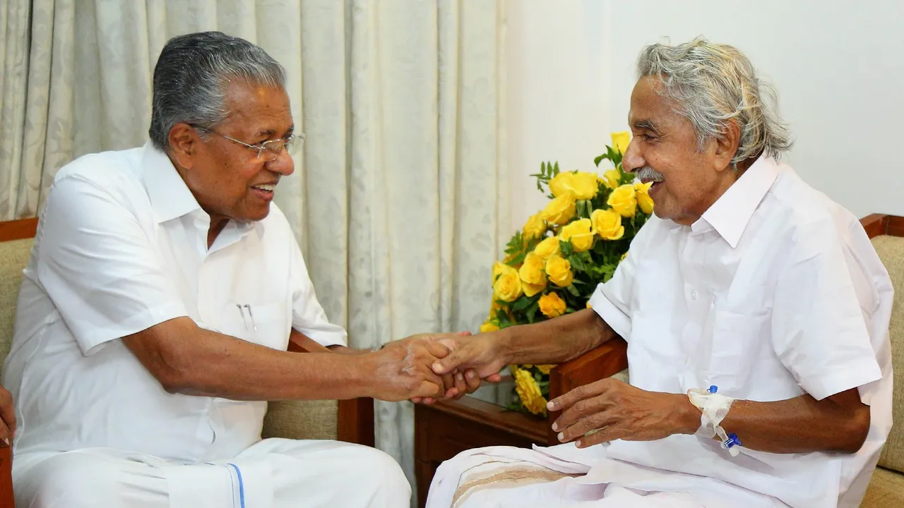 In this Monday, Oct. 31, 2022, file photo, Kerala Chief Minister Pinarayi Vijayan meets with former chief minister Oommen Chandy, in Kochi