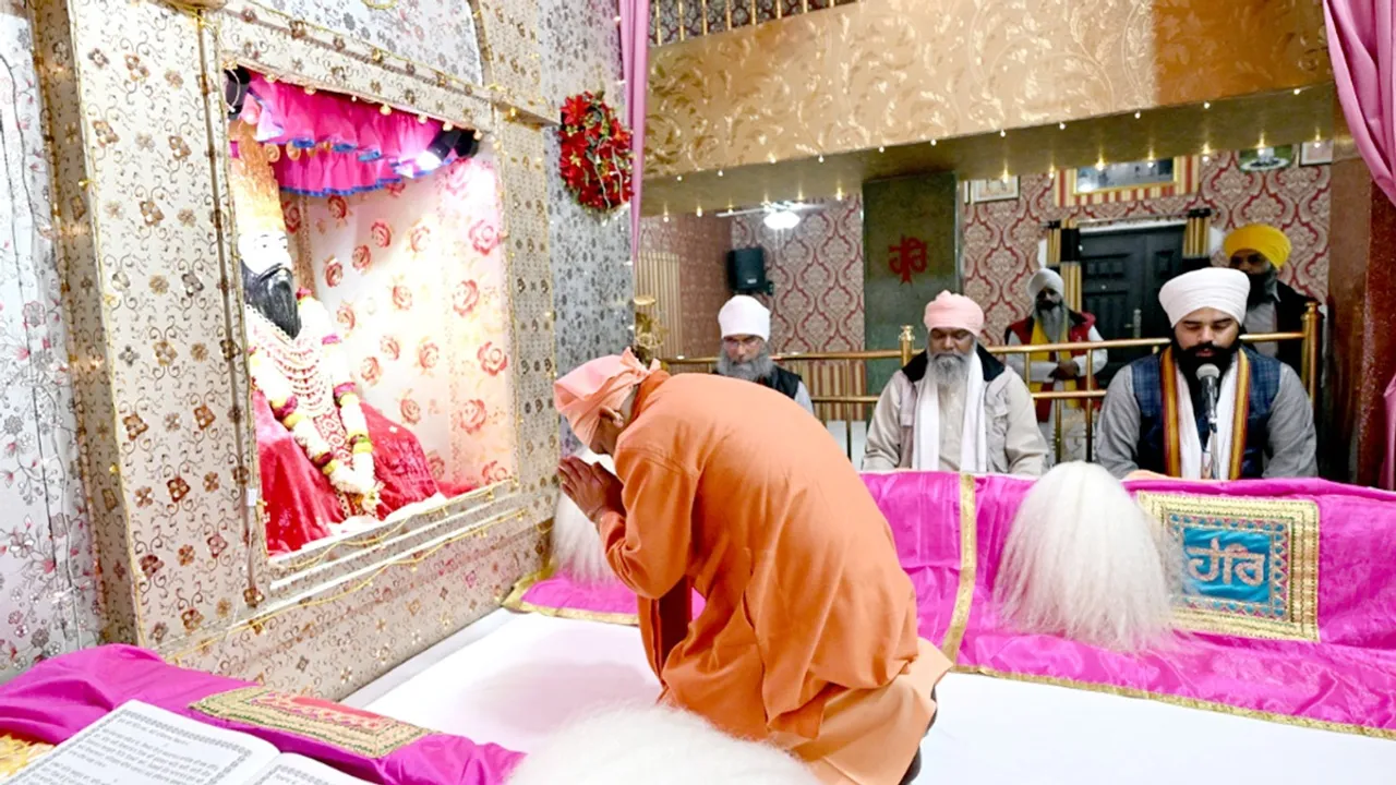 Uttar Pradesh Chief Minister Yogi Adityanath offers prayers at Sant Ravidas Temple, in Varanasi