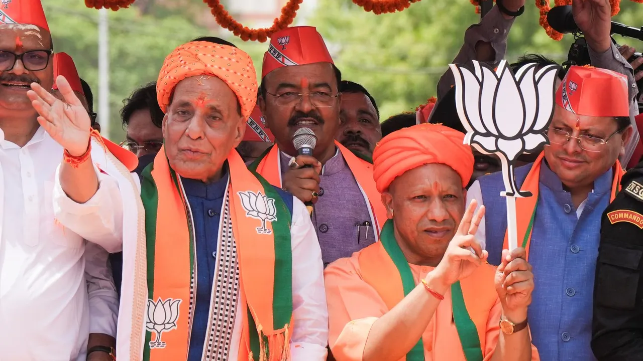 Defence Minister and BJP candidate Rajnath Singh with Uttar Pradesh Chief Minister Yogi Adityanath, Uttarakhand Chief Minister Pushkar Singh Dhami, and UP Deputy Chief Ministers Brajesh Pathak and Keshav Prasad Maurya during a road show before filing his nomination for Lok Sabha elections, in Lucknow