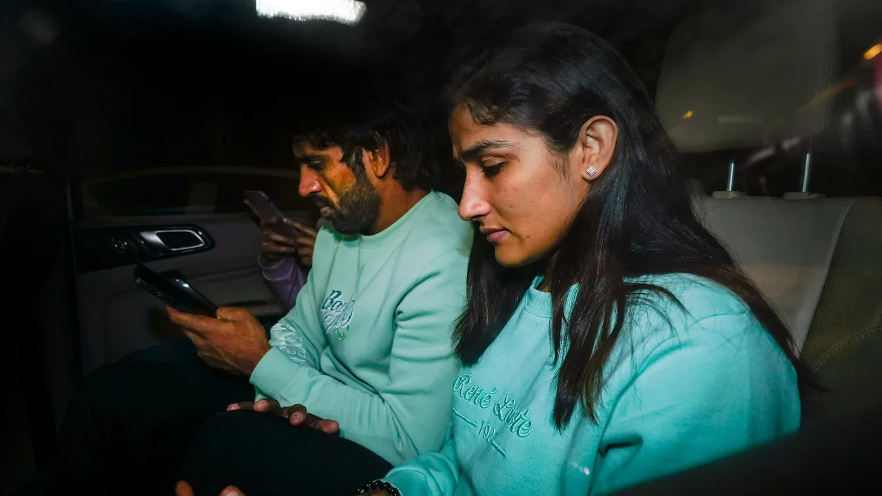Wrestlers Vinesh Phogat and Bajrang Punia arrive for a meeting with Sports Minister Anurag Thakur regarding their protest against WFI on Thursday