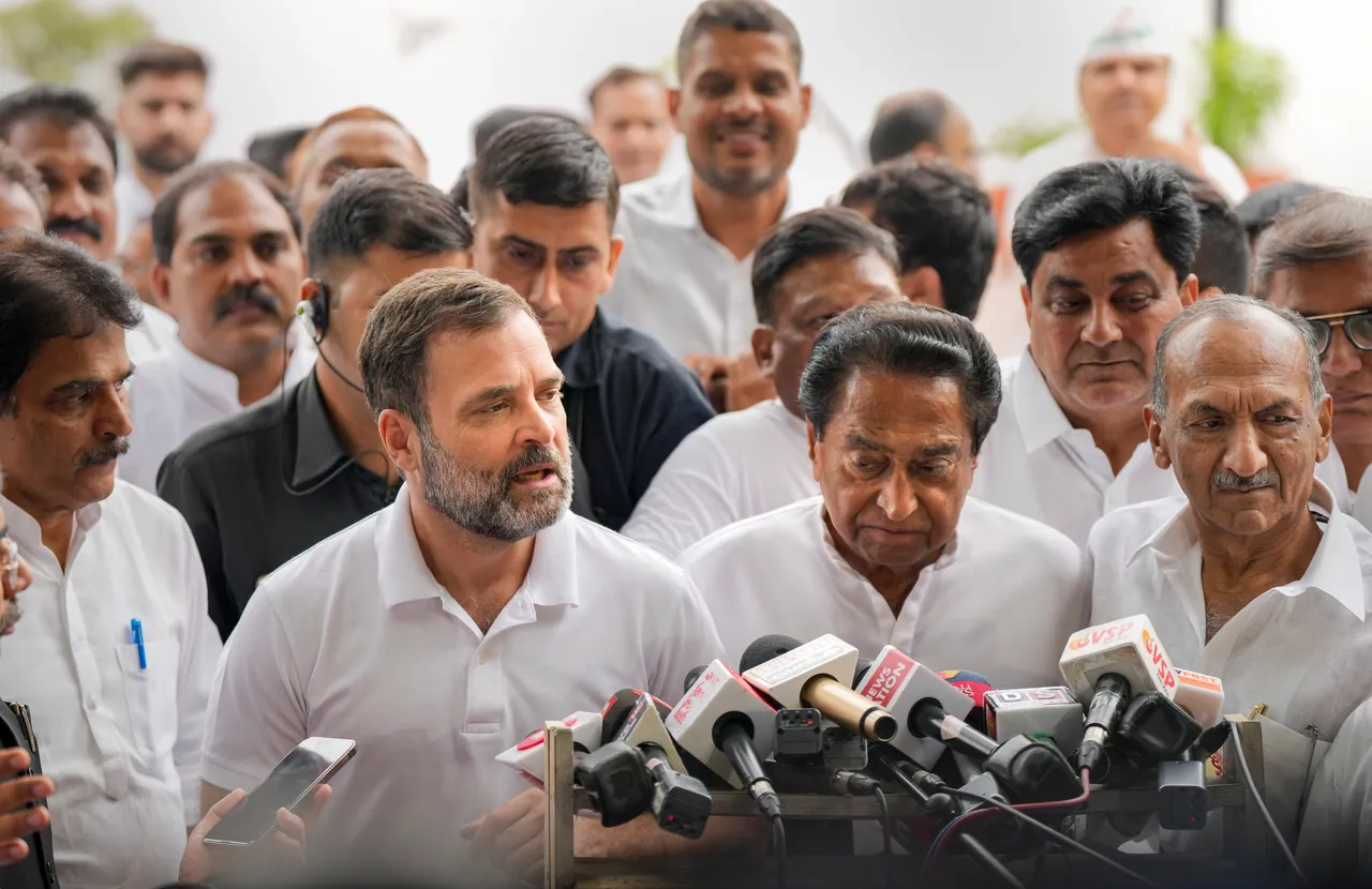 Congress leader Rahul Gandhi with party leaders Kamal Nath and J.P. Agarwal interacts with media after a meeting with the leaders from Madhya Pradesh
