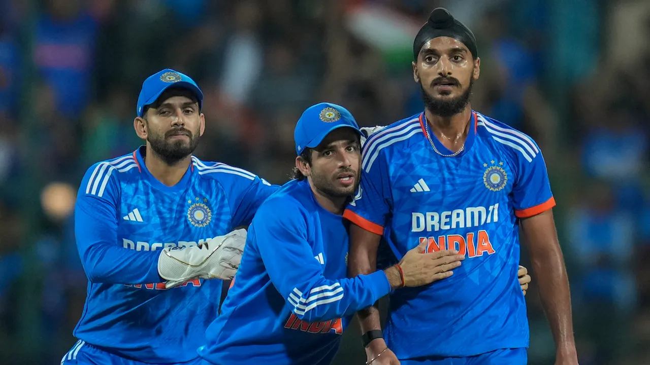 Arshdeep Singh celebrates the wicket of Australian batter Ben McDermott during the 5th T20I cricket match between India and Australia, at M. Chinnaswamy Stadium, in Bengaluru, Sunday, Dec. 3, 2023.