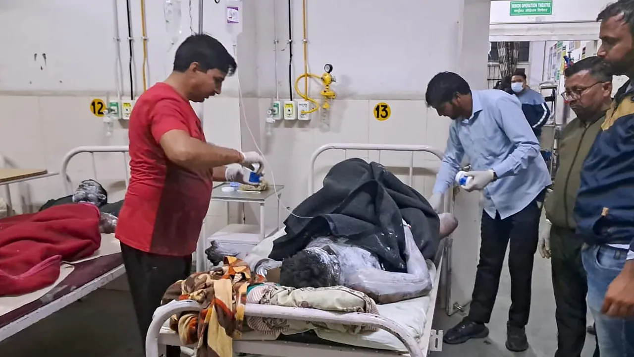 An injured being treated at a hospital after a blast occured in the boiler of a spare parts manufacturing facility, in Rewari district
