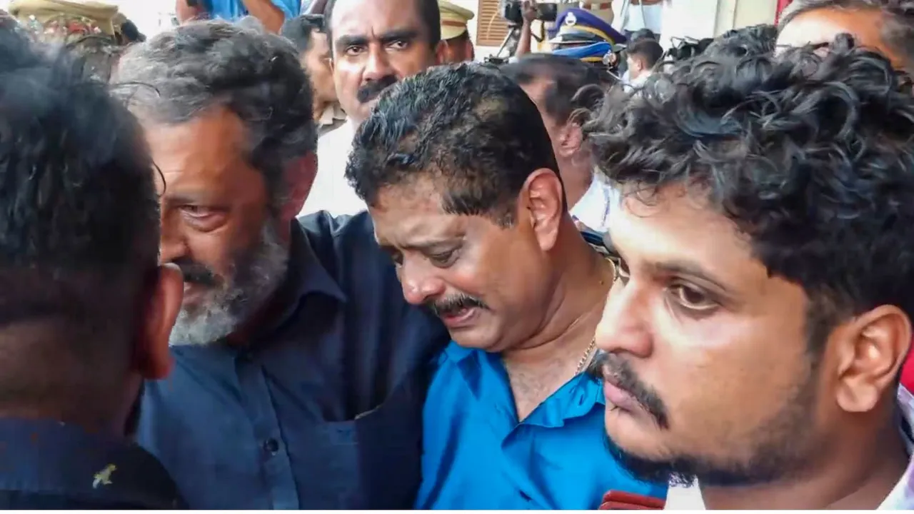 Relatives react as bodies of the Indians killed in the fire incident in Kuwait are sent to their homes after an Indian Air Force (IAF) flight carrying the bodies arrived at the Cochin International Airport, in Kochi, Friday, June 14, 2024.