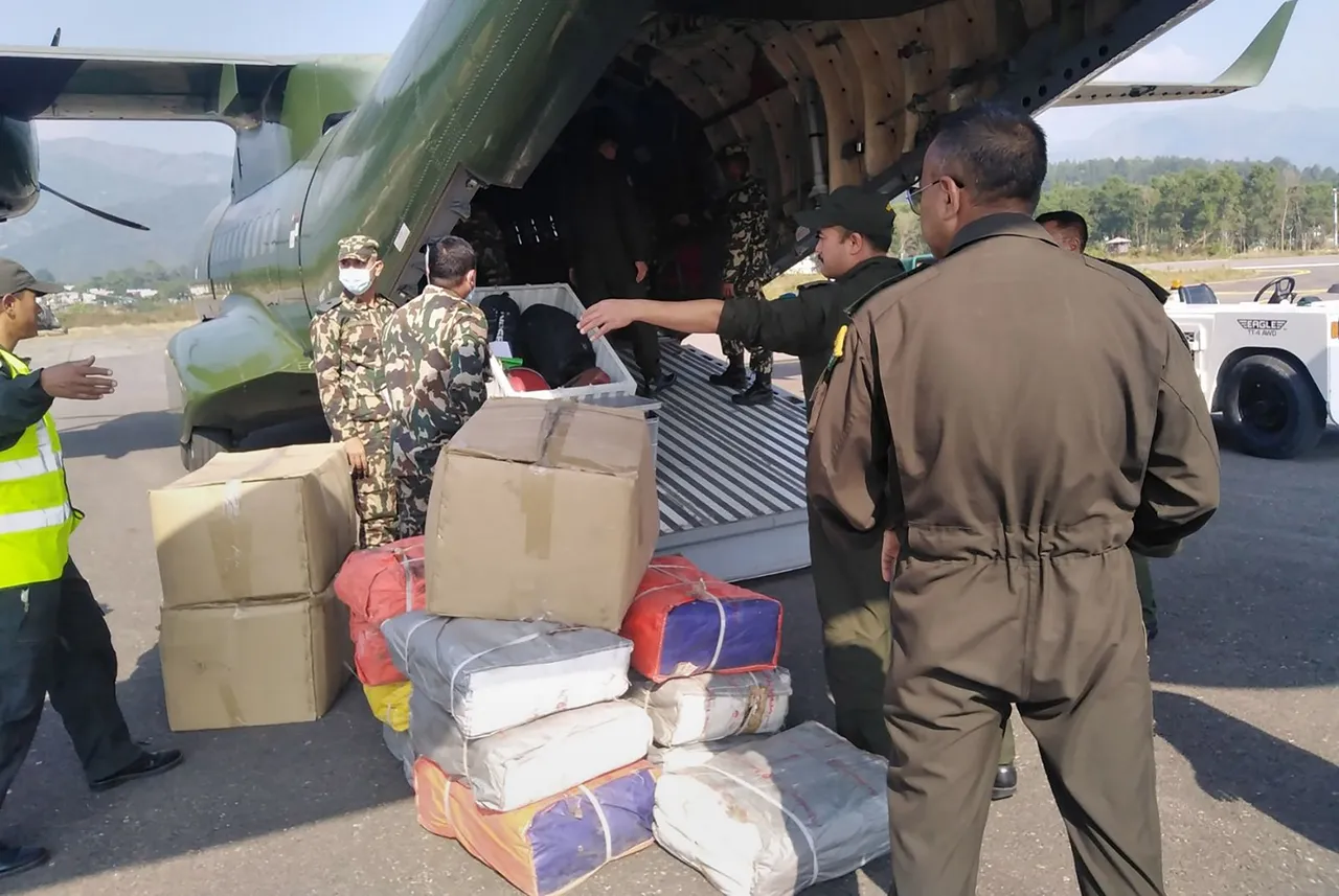 Nepal Army personnel dispatch relief material for earthquake victims, in Nepal