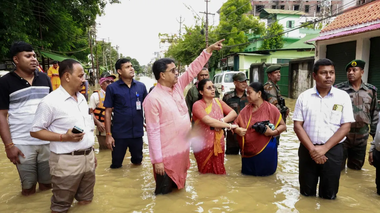 Tripura Chief Minister Manik Saha inspects a flood-affected area after heavy rains, on the outskirts of Agartala, Thursday, Aug. 22, 2024.