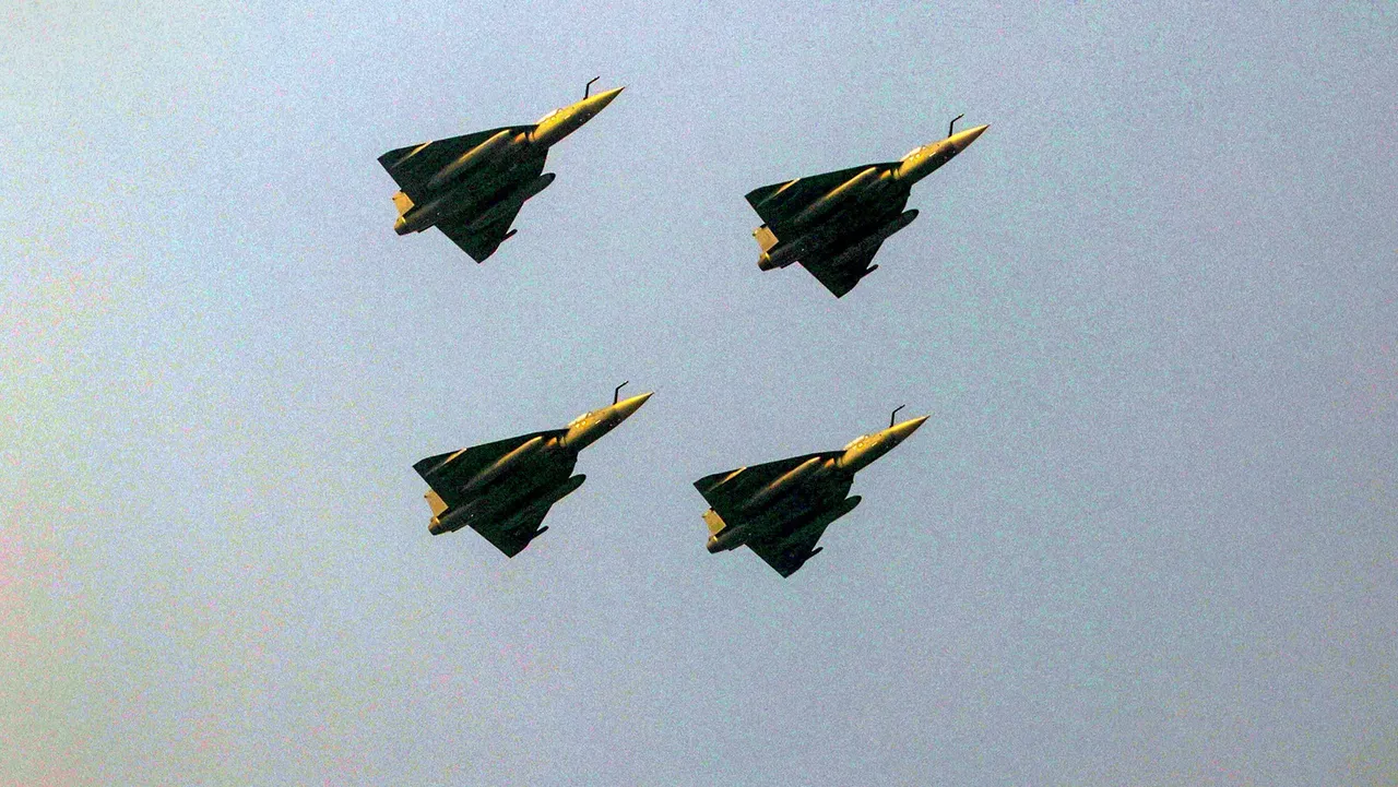 Four Tejas aircrafts fly past in 'Diamond' formation during the 75th Republic Day parade