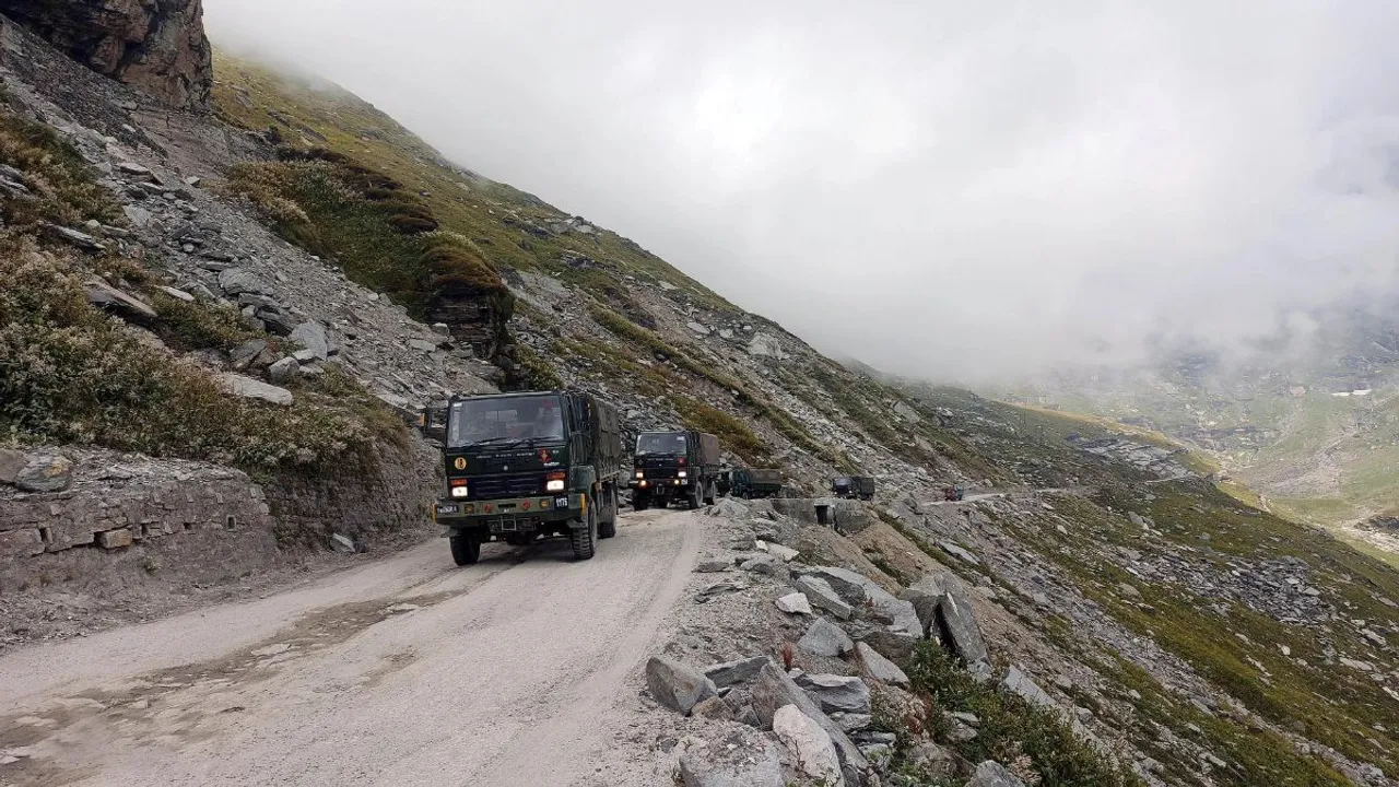Army Vehicles Carrying Military Material For Soldiers Deployed Along The Border From Rohtang Pass On Manali-Leh Highway. 