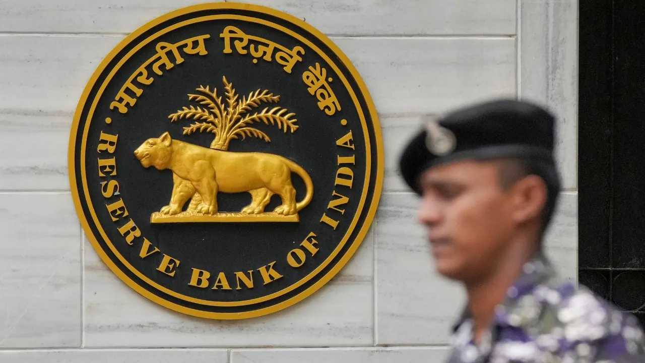 A security personnel stands near the RBI headquarters, in Mumbai, Friday, June 7, 2024.