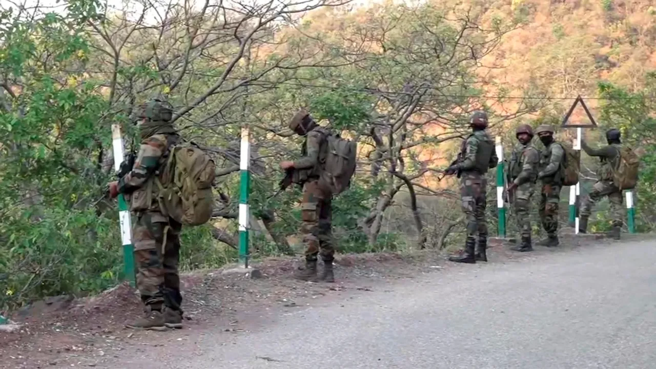 Security personnel during a search operation after a bus carrying pilgrims was ambushed by terrorists, in Reasi district of Jammu and Kashmir, Monday, June 10, 2024. At least 9 people were killed and 33 others suffered injuries in the terror attack on the bus, according to officials.