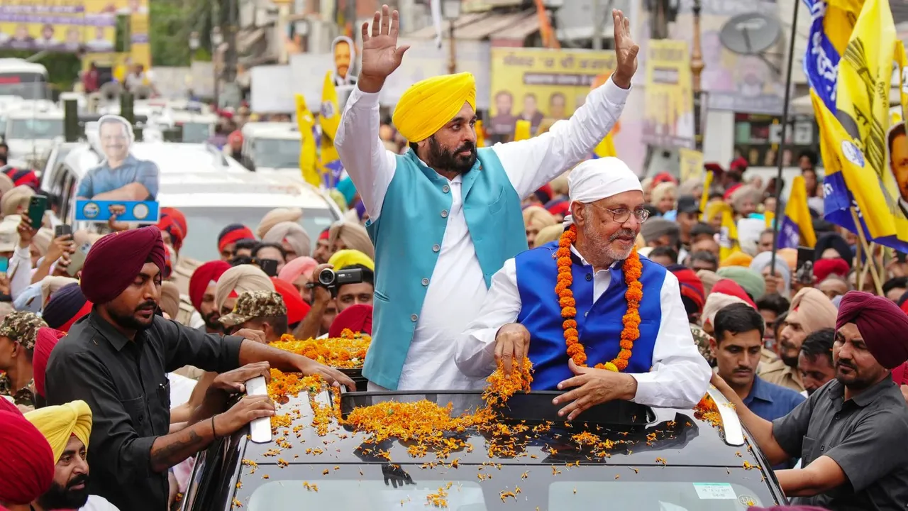Punjab Chief Minister Bhagwant Mann during a roadshow in support of AAP candidate from Patiala seat Balbir Singh for Lok Sabha polls, in Patiala, Friday, may 3, 2024