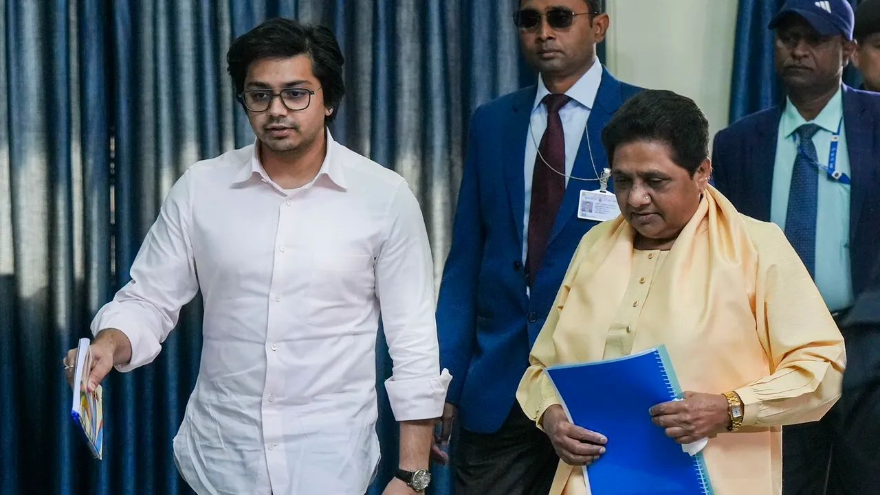 Bahujan Samaj Party (BSP) supremo Mayawati with her nephew Akash Anand arrives for a meeting of party's office bearers ahead of the 2024 Lok Sabha elections