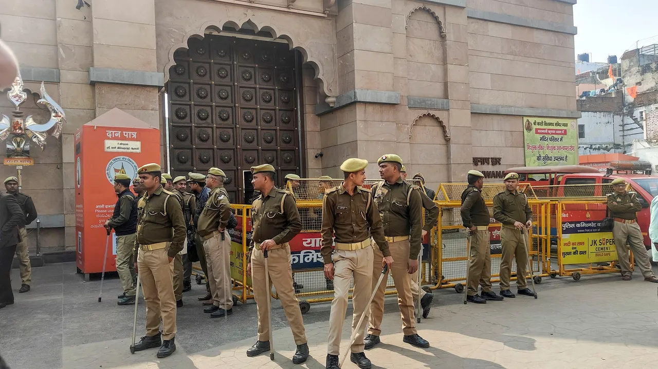 Security personnel conduct a flag march during 'Varanasi bandh' called by the Muslim community