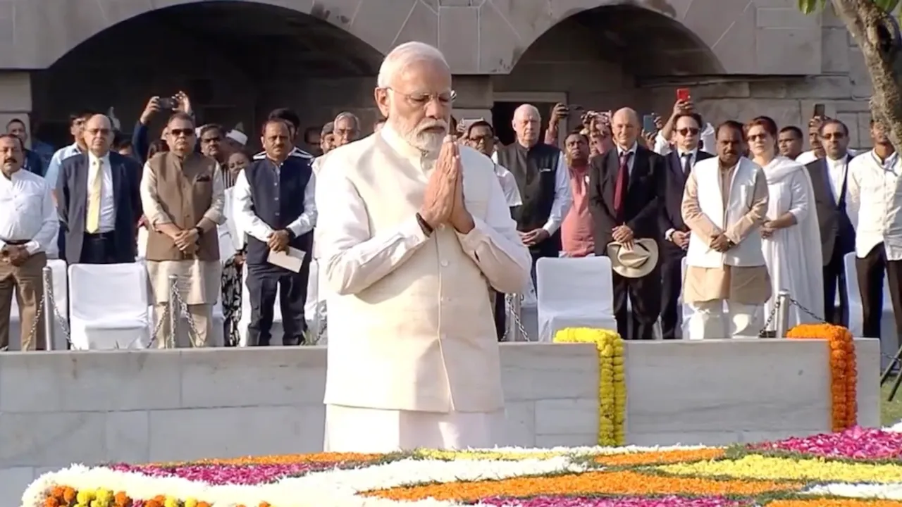 Narendra Modi pays floral tributes to Mahatma Gandhi at Rajghat, New Delhi
