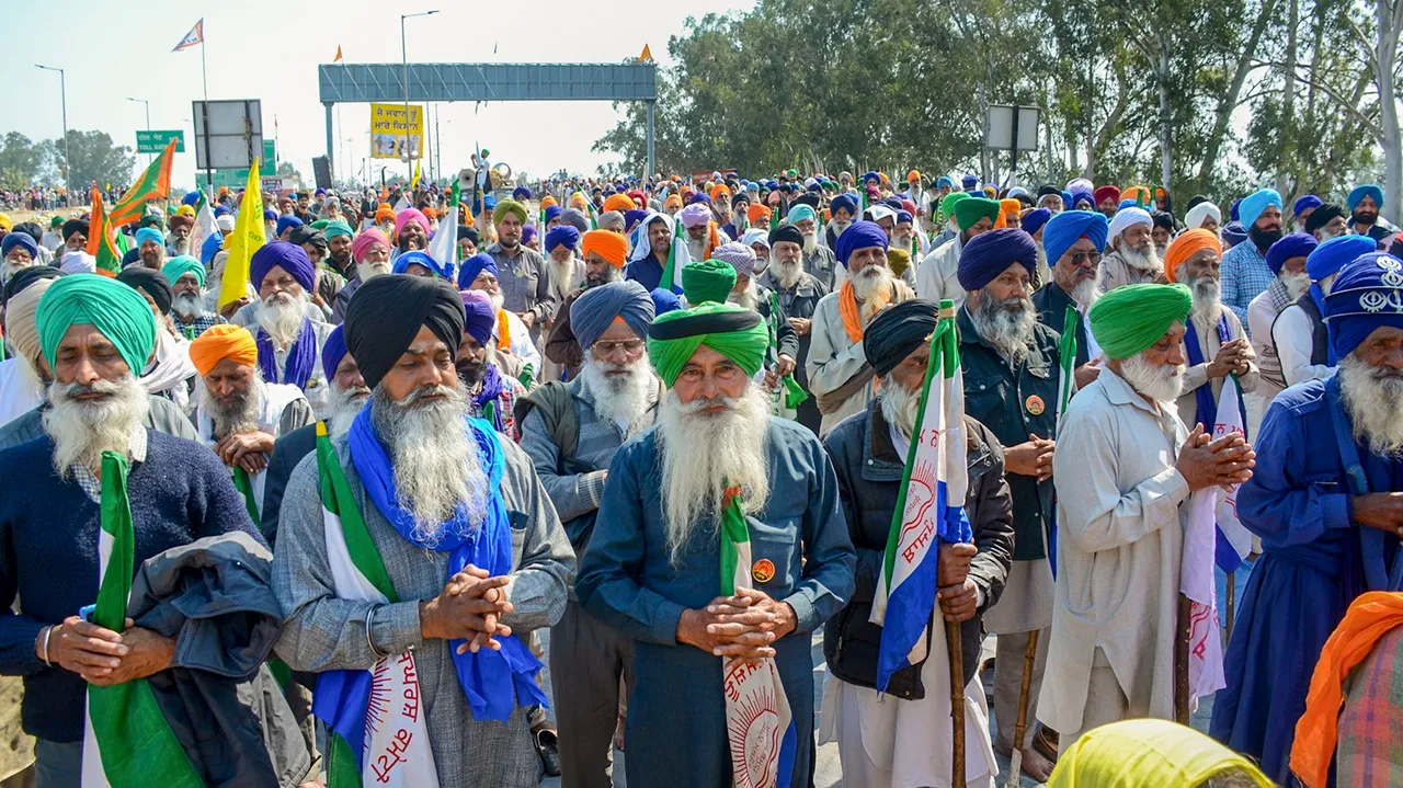 Farmers offer 'ardas' during their 'Delhi Chalo' march, near the Punjab-Haryana Shambhu border, in Patiala district