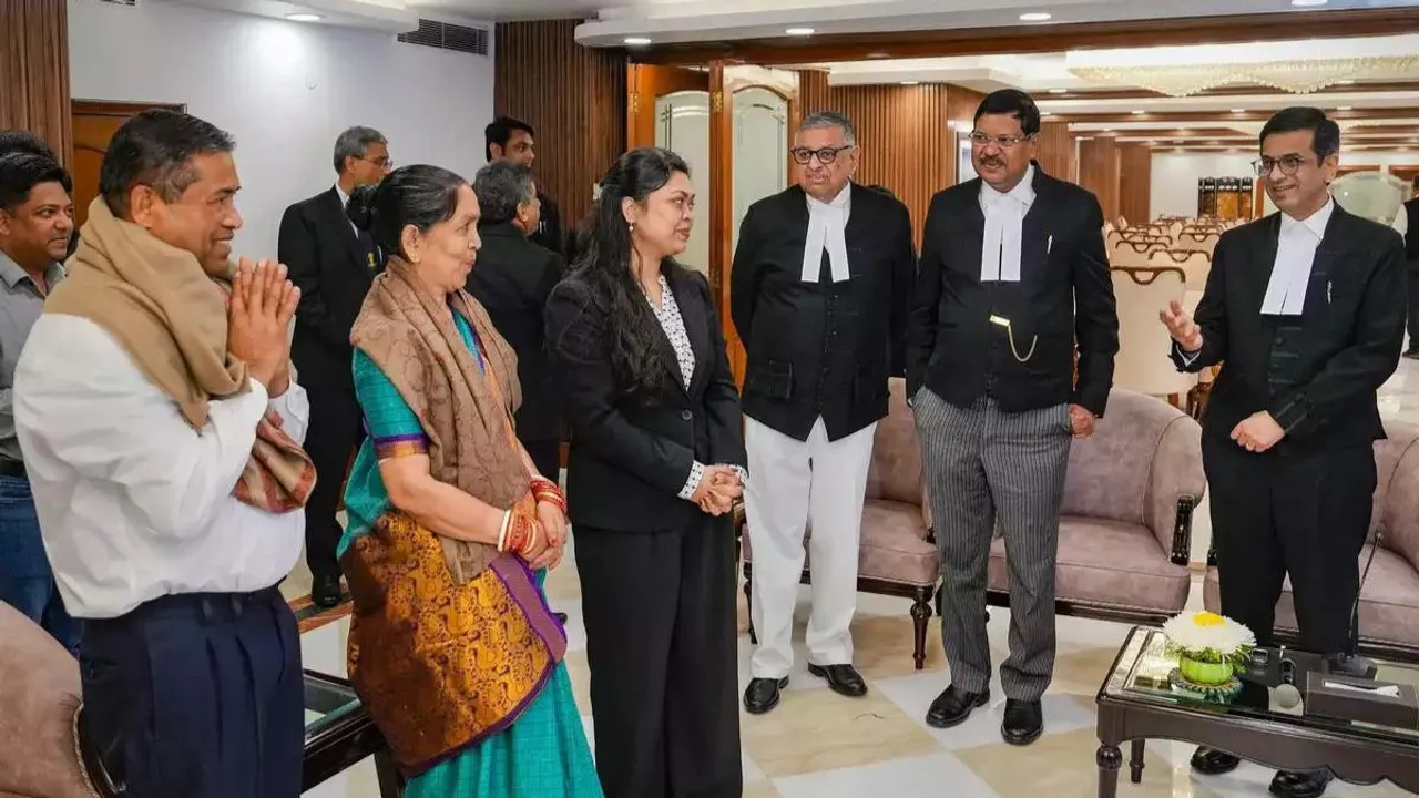 Pragya, with her parents during her felicitation by the Supreme Court judges, at the Supreme Court of India in New Delhi. 