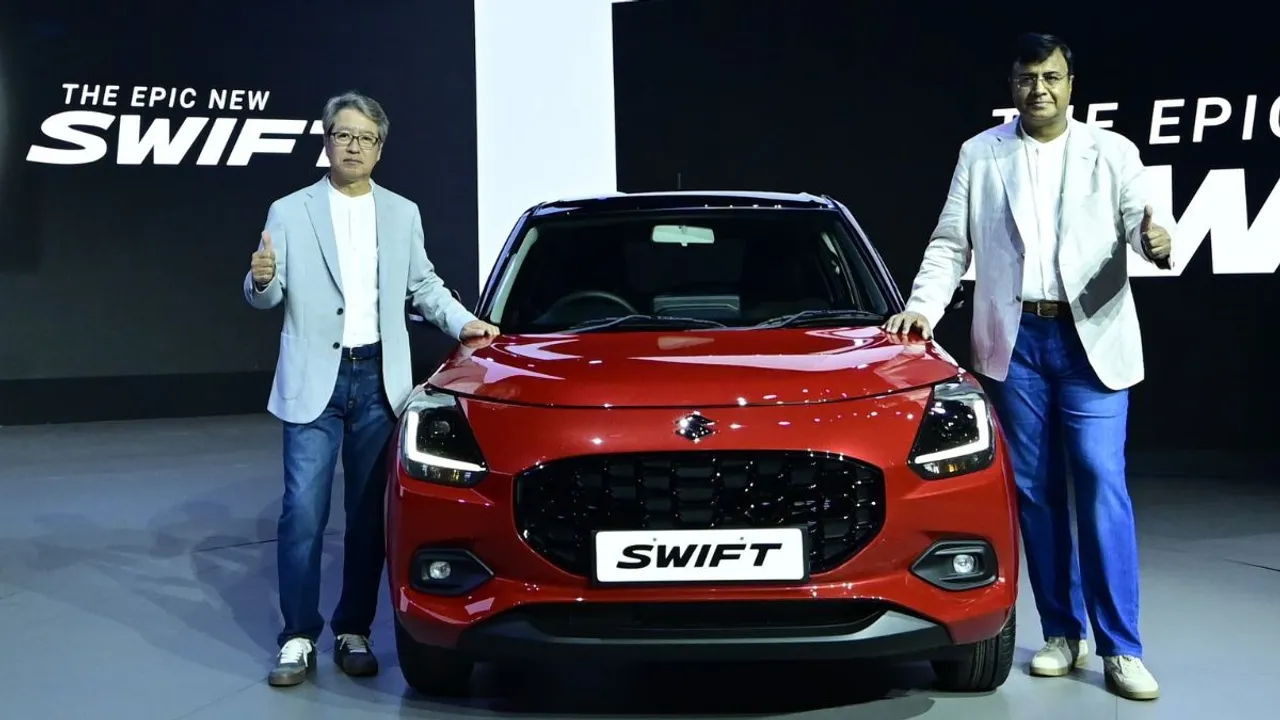  Mr. Hisashi Takeuchi, Managing Director & CEO, and Mr. Partho Banerjee, Senior Executive Officer, Marketing & Sales, Maruti Suzuki India Limited at the launch of the Epic New Swift