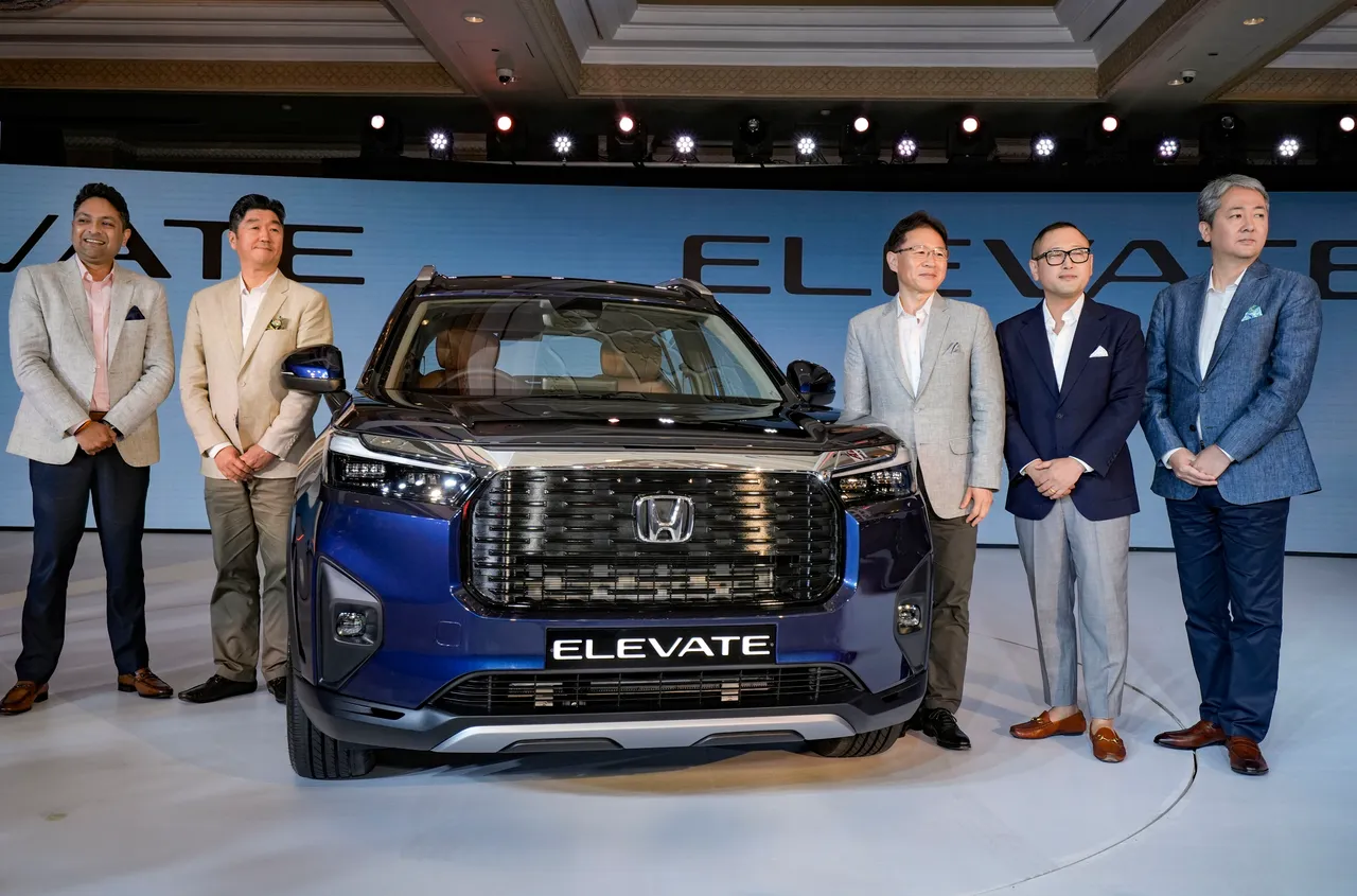Honda Cars India Ltd. President and CEO Takuya Tsumura (2nd from left) and others pose for photos at the launch of the new Honda 'Elevate', in New Delhi