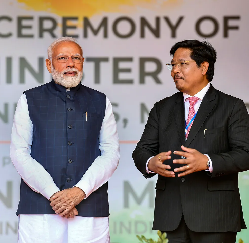 Prime Minister Narendra Modi with Meghalaya Chief Minister Conrad Sangma during the latter's swearing-in ceremony in Shillong on Tuesday