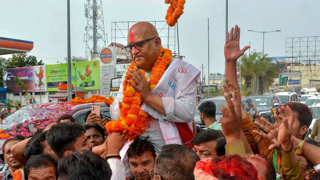 UP Congress chief and party candidate for Varanasi Lok Sabha seat Ajai Rai being welcomed by supporters on his arrival in Varanasi