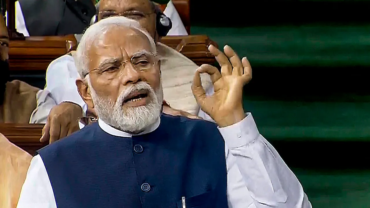 Prime Minister Narendra Modi replies on the Motion of No-Confidence in the Lok Sabha in the Monsoon session of Parliament, in New Delhi, Thursday, Aug. 10, 2023