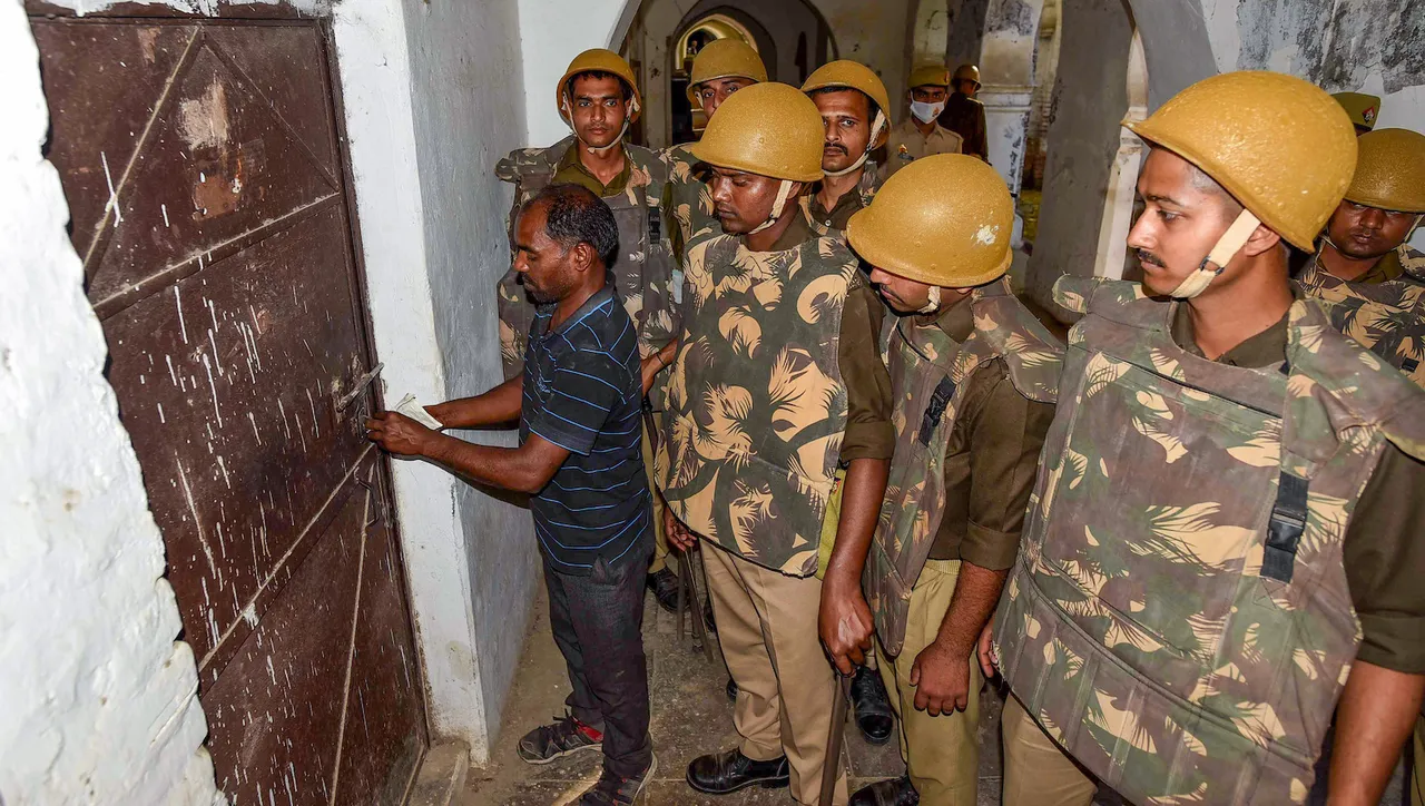 A room being sealed during a raid by UP Police at Allahabad University's Muslim hostel in connection with the Umesh Pal murder case, in Prayagraj, Monday