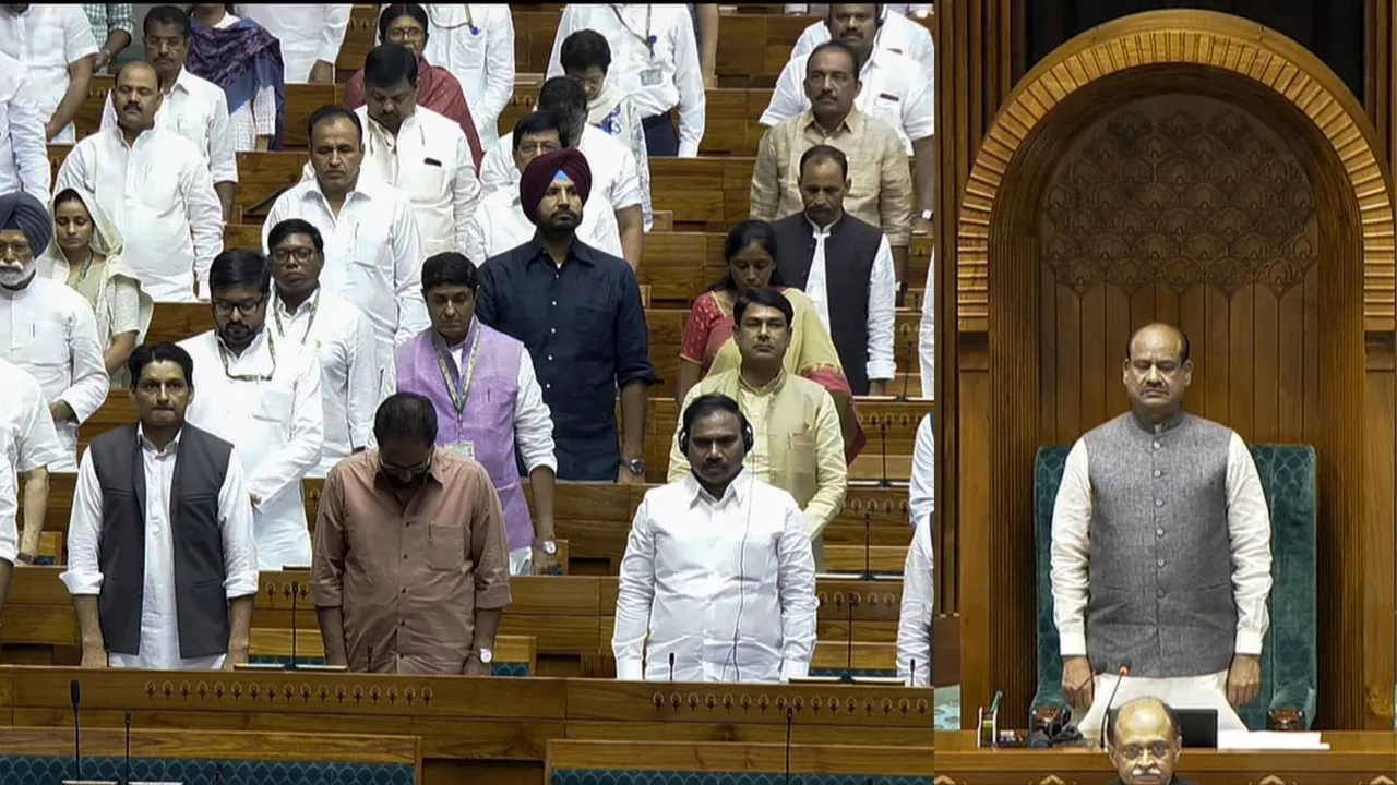 Lok Sabha Speaker Om Birla and other MPs stand to pay homage to the Kargil War martyrs on the 25th anniversary of the Kargil Vijay Diwas in Lok Sabha during the Monsoon session of Parliament, in New Delhi, Friday, July 26, 2024.