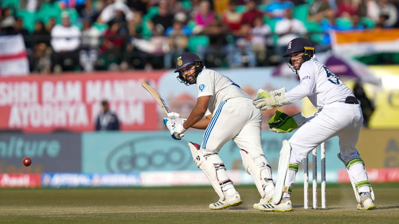 India's batter Rohit Sharma plays a shot during the first day of the fifth Test cricket match between India and England, in Dharamshala
