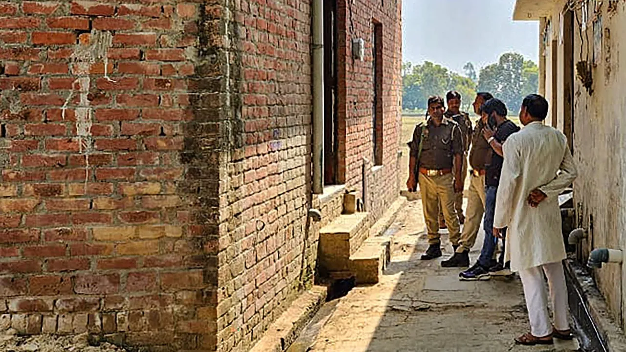 Security personnel deployed outside the residence of Sajid, who allegedly killed two boys on Tuesday, at Sakhanu village in Budaun district