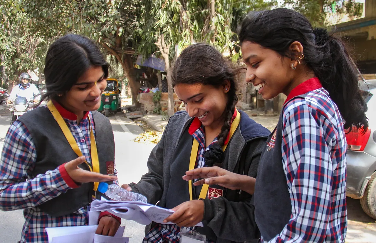 Students outside an examination centre before appearing for the CBSE class 10 examination