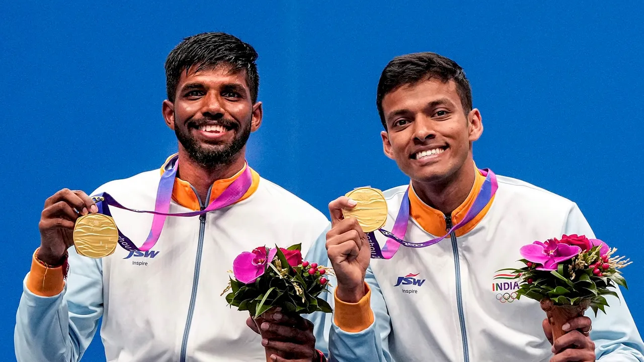Gold medalists India’s Chirag Shetty and Satwiksairaj Rankireddy pose for photos during the presentation ceremony