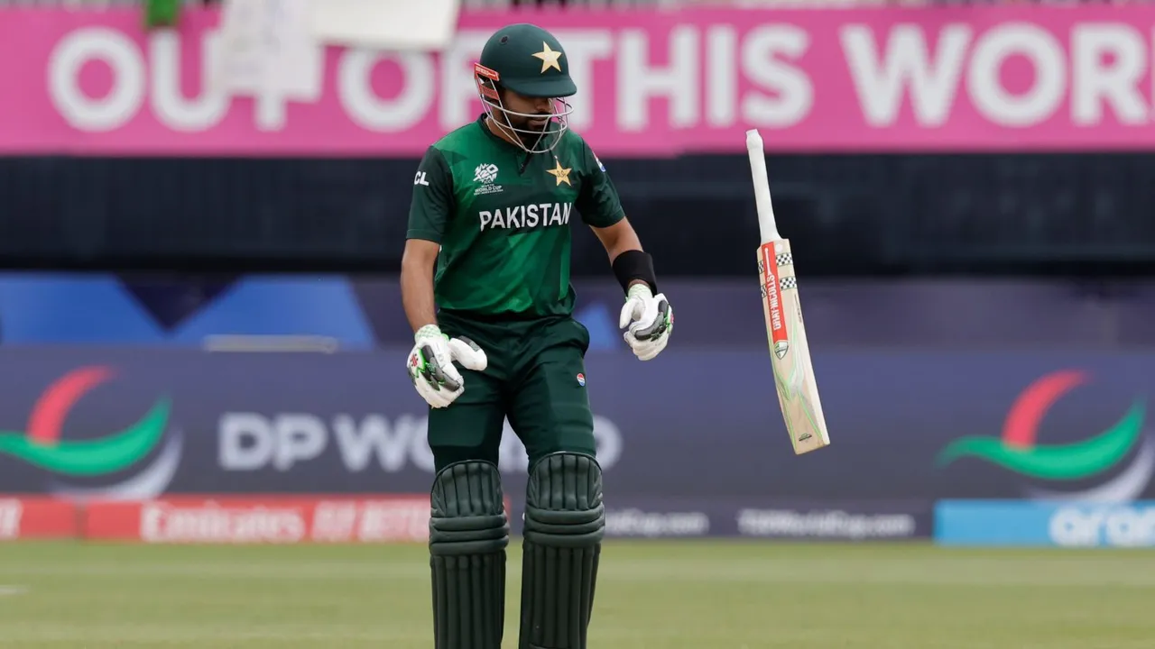 Pakistan's captain Babar Azam throws his bat after losing his wicket during the ICC Men's T20 World Cup cricket match