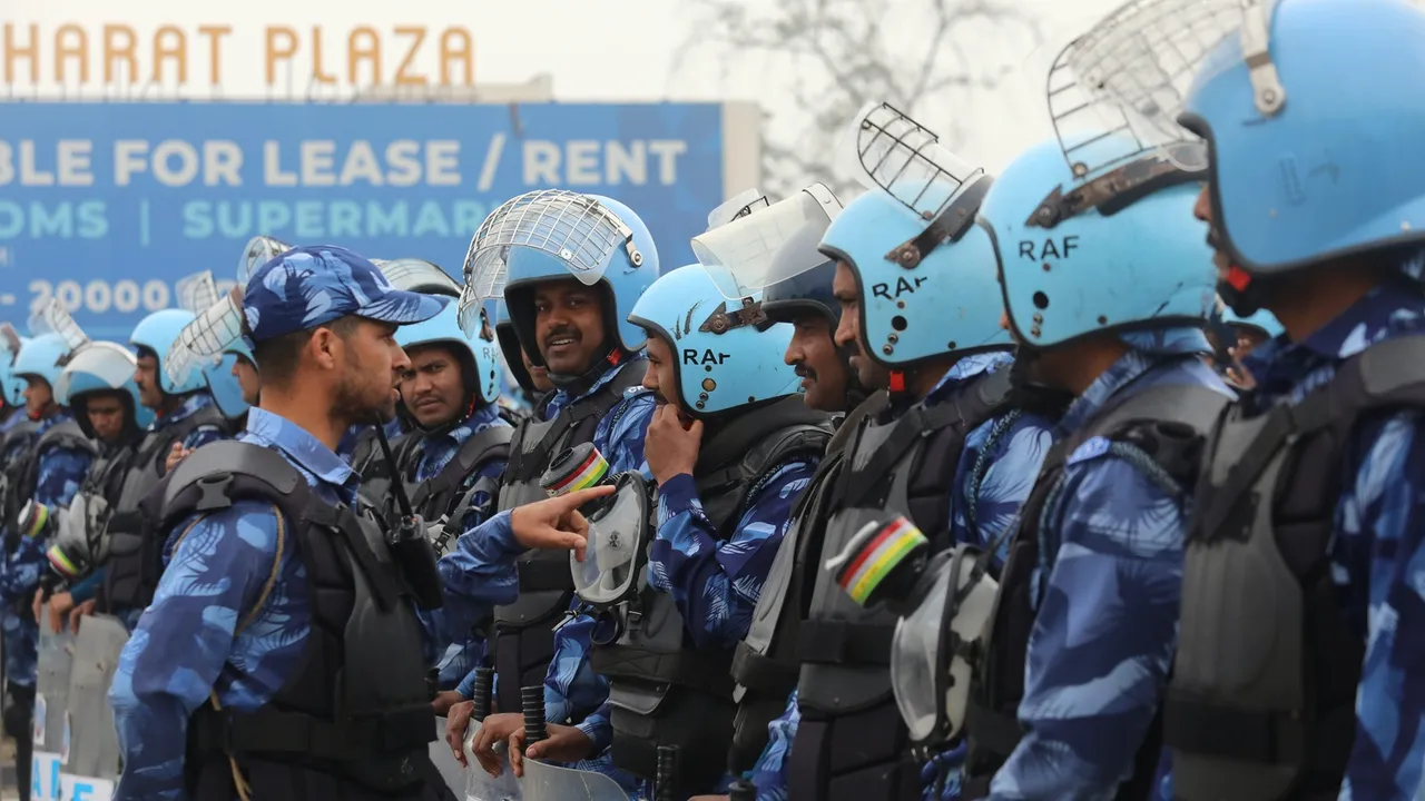 Security personnel stand ahead of the protesting farmers’ ‘Delhi Chalo’ March, at the Singhu Border, in New Delhi