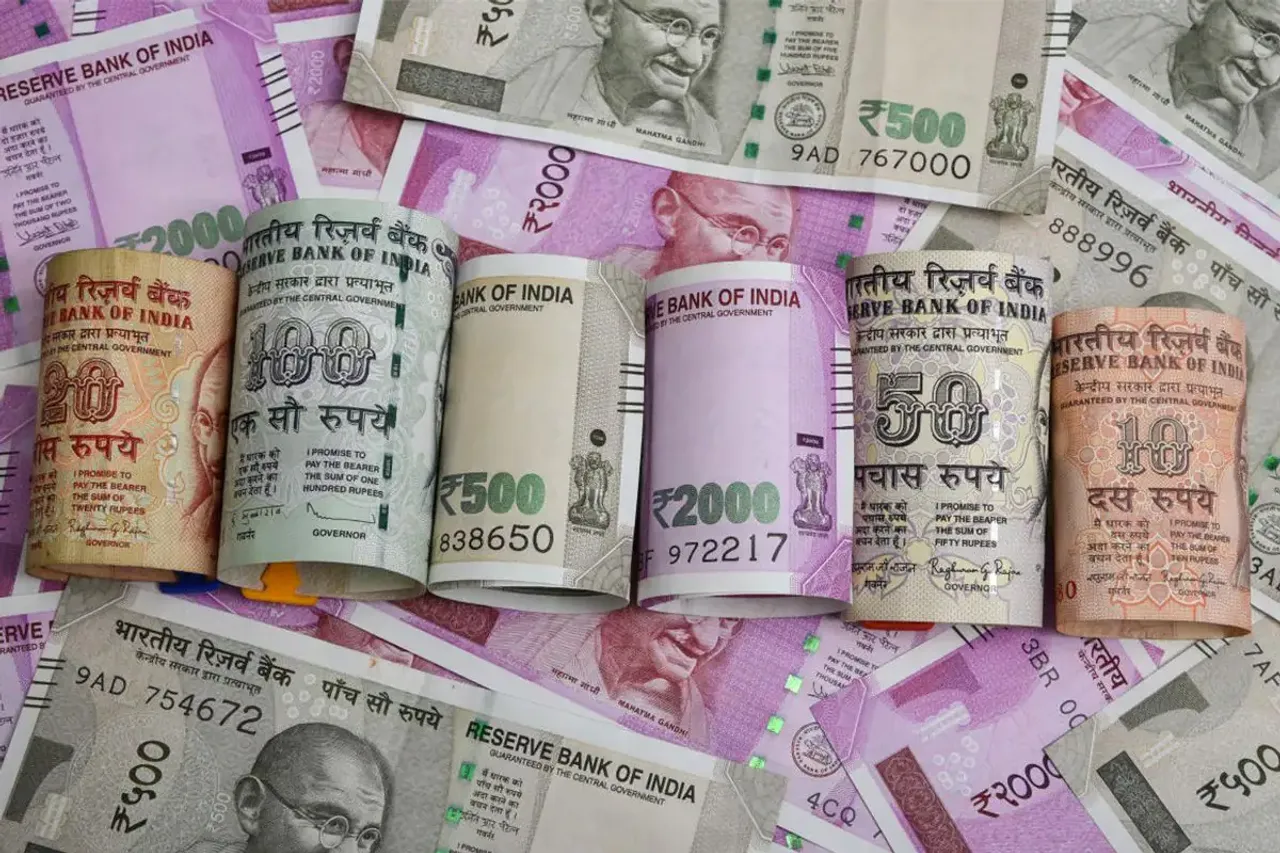 Rupee falls 14 paise to settle at 83.27 against US dollar