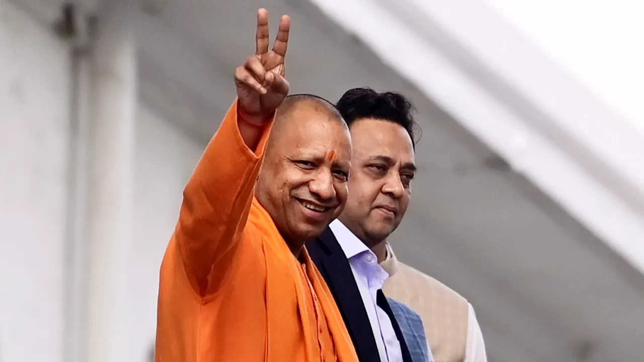 Uttar Pradesh Chief Minister Yogi Adityanath leaves after casting his vote for the Rajya Sabha election, in Lucknow