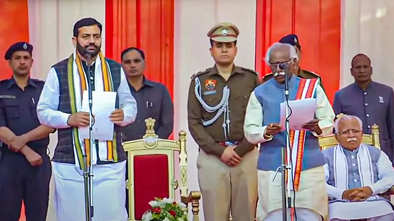 Haryana Governor Bandaru Dattatreya administers the oath to BJP leader Nayab Singh Saini as chief minister of Haryana