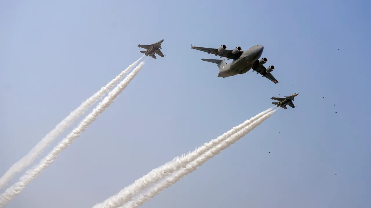Indian Air Force (IAF) aircrafts fly past during the Republic Day parade, in New Delhi