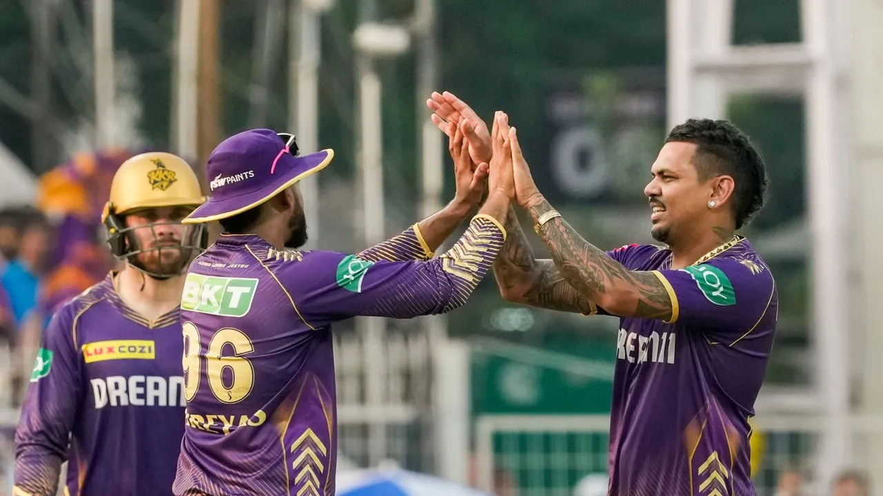 Kolkata Knight Riders' Sunil Narine celebrates with teammates after taking the wicket of Lucknow Super Giants Ayush Badoni during an Indian Premier League (IPL) 2024 cricket match